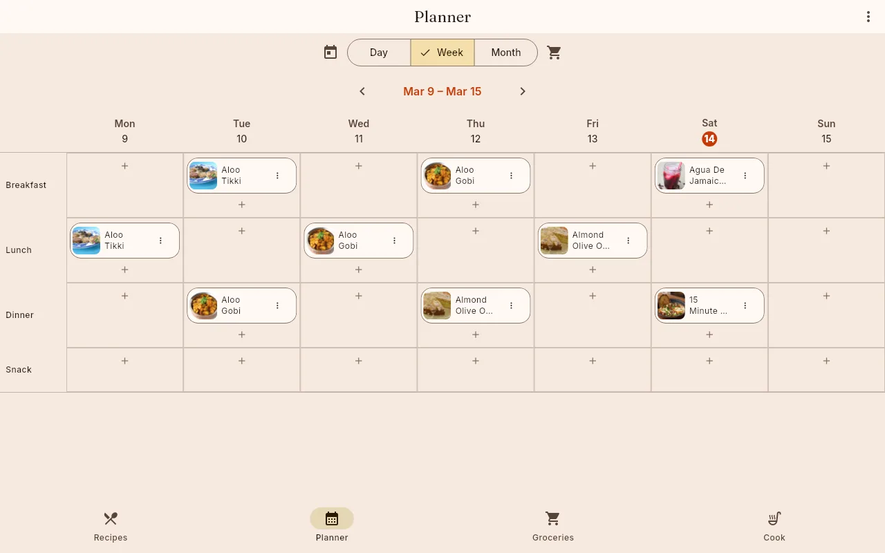 The shiso weekly planner: days Monday to Sunday as columns, Breakfast, Lunch, Dinner and Snack as rows, with recipe chips placed in some cells and a plus button in every empty one. Day, Week and Month tabs sit above.